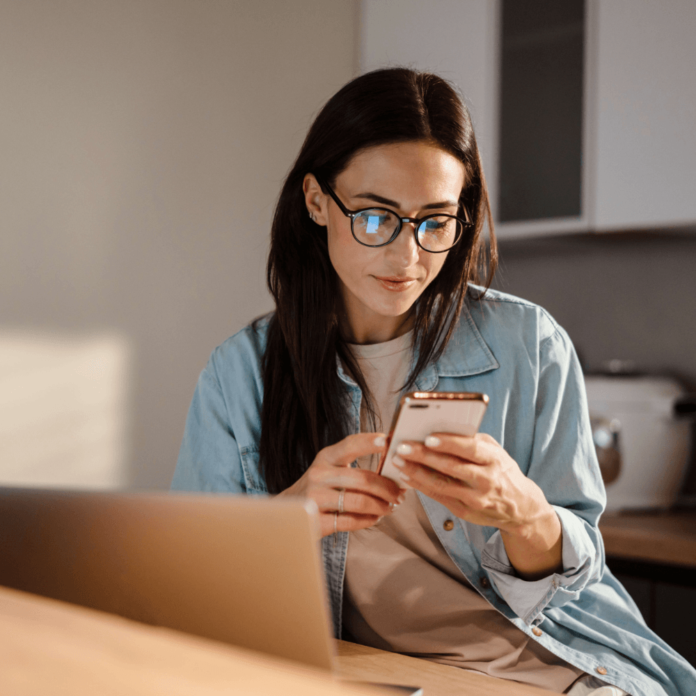 women looking at her phone