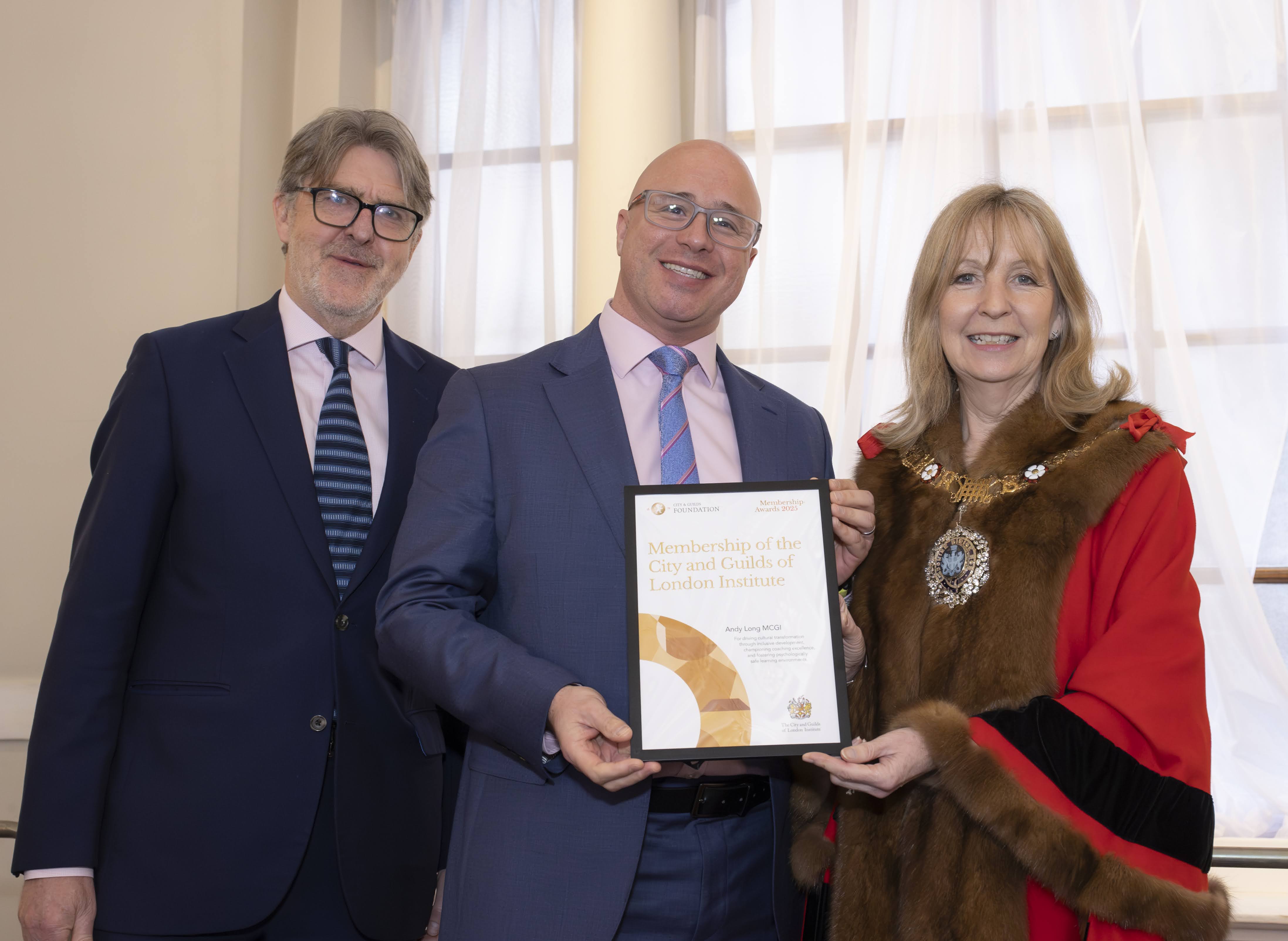 Andy long receiving his award